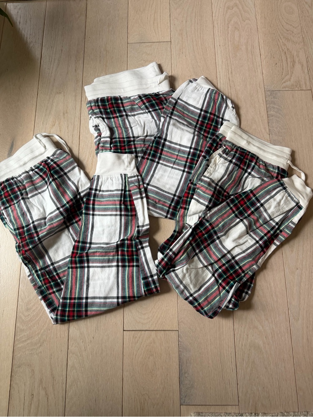 stars above White Plaid holiday Pajama Pants with Red & Green Accents 2-S 1-L